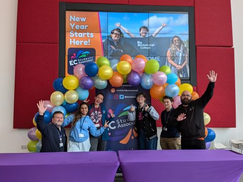 The ECSA Team under a balloon arch at Freshers Week 24 