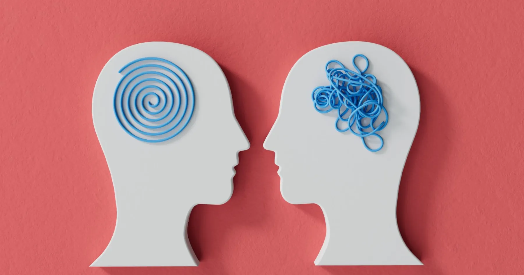 Two silhouettes with disordered twine where their brains are 